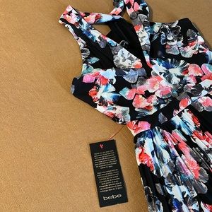 * NEW Bebe cross over Pltd floral Dress